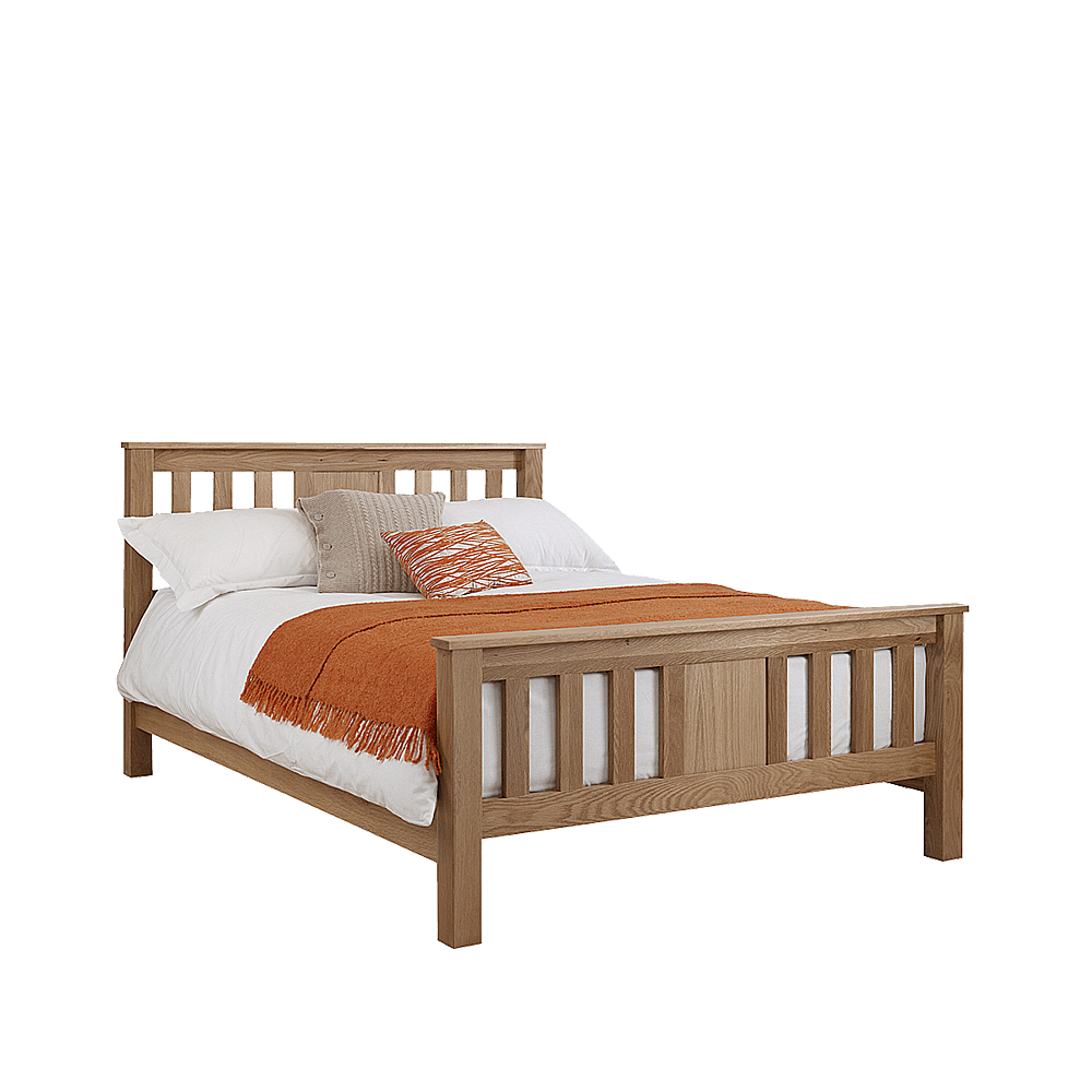 solid oak bed with slatted headboard and footboard.